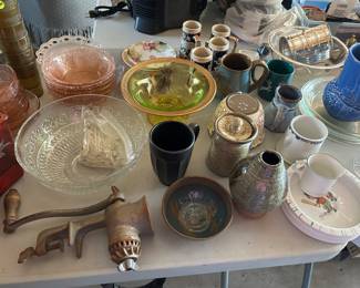 Many vintage glassware and pottery items.