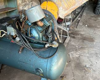 Cement mixer and large air compressor.
