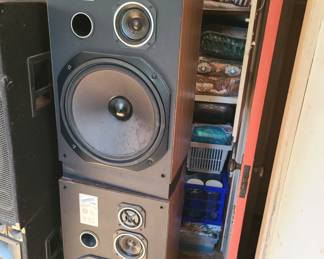 Pair of speakers, one of several sets, used by amateur musician.