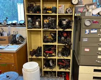 Wall of routers, skil saws and sanders