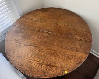 $250 Antique oak pedestal table; approx. 28" x 42" dia.