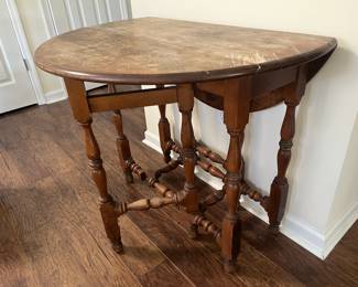 $125 Antique gate leg table; approx. 29.5" x 35.5" (with legs extended)