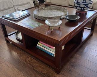 $150 Large modern two-tiered coffee table; approx. 18.5" x 45" sq.