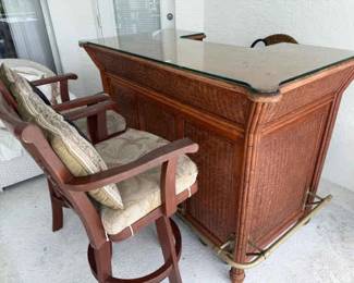 Beautiful Ornate Wood Bar With Two Bar Stools Has Been Used Under Cover Outside