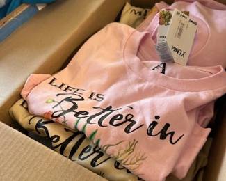6.  Boxes of Sweatshirts Ts