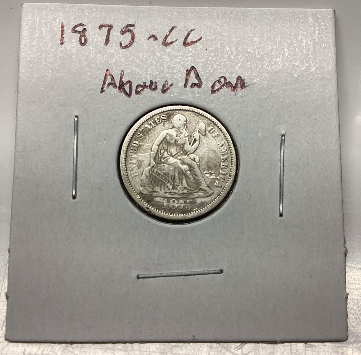 1875 Carson City Dime Above Bow Mint 1875 Carson City Dime Above Bow Mint