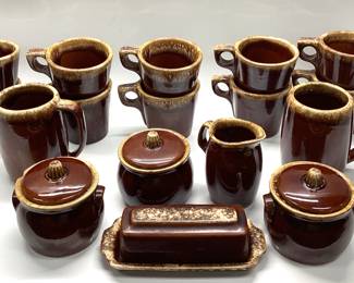 34 PCS HULL POTTERY BROWN DRIP GLAZE 34 PIECES INCLUDING NESTING DUCK, BUTTER DISH, 2 OAK LEAVES, STAG ASHTRAY AND MORE.
