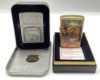 (2) ZIPPO 1998 SILVER PLATE & 1996 BRASS ZIPPO CAMEL LIGHTERS BARRETT SMYTHE