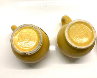 4 PCS LIGHT DAMAGED McCOY POTTERY 4 PCS LIGHT DAMAGED McCOY POTTERY. HAPPY MUGS ARE CHIPPED. BOWL AND VASE HAVE MINOR FRACTURES. SEE PHOTOS.