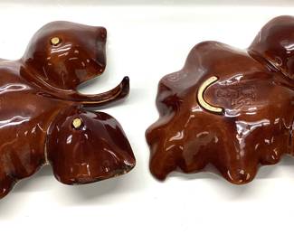 34 PCS HULL POTTERY BROWN DRIP GLAZE 34 PIECES INCLUDING NESTING DUCK, BUTTER DISH, 2 OAK LEAVES, STAG ASHTRAY AND MORE.