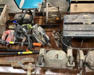 ASSORTED TABLE LOT, TOOLS, GRINDERS, JIG SAWS, CHAINSAWS, TABLE SAW, HITCH
