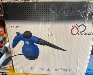 In box electric steam cleaner