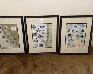 These are framed lighthouse prints featuring detailed illustrated maps of California, Oregon, and Washington lighthouses. Each piece highlights the coastal locations and unique architecture of the lighthouses, making them perfect for nautical décor or regional collectors.