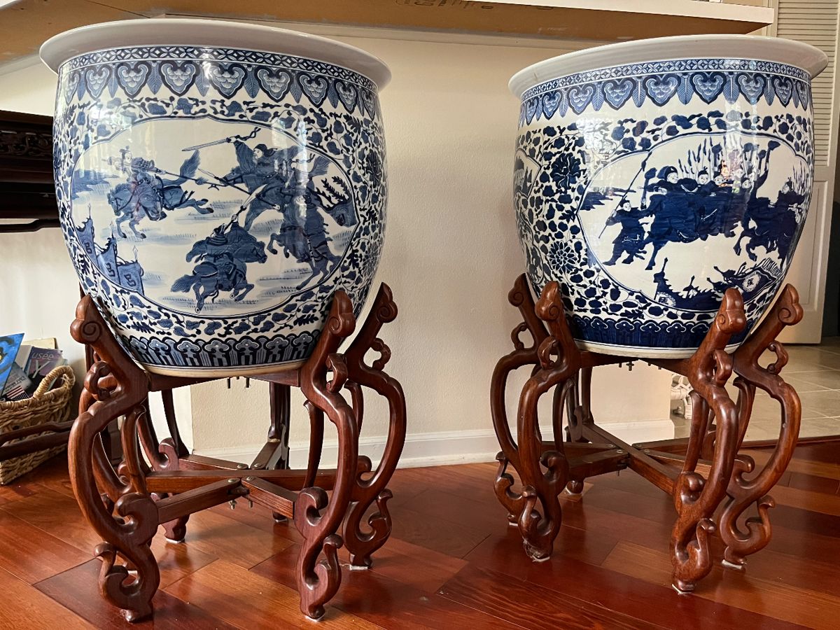 Pair of fabulous, matching, blue and white porcelain fishbowls (with stands) from the Orient. Measure 20.5 " in diameter and 19" tall. Will sale individually or as a pair.