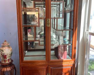 Vintage rosewood mirrored curio cabinet. 80" tall x 40" wide x 14" deep.