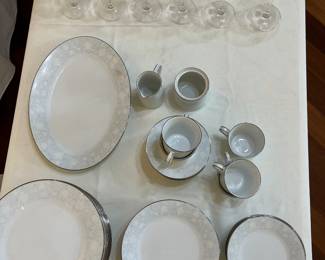 8 settings of Noritake Ravel pattern fine China.