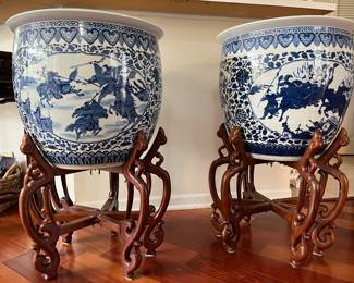 Pair of fabulous, matching, blue and white porcelain fishbowls (with stands) from the Orient. Measure 20.5 " in diameter and 19" tall. Will sale individually or as a pair.