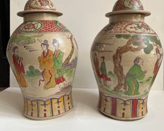 Pair of ginger jars from the Orient. Will sell as a pair only.