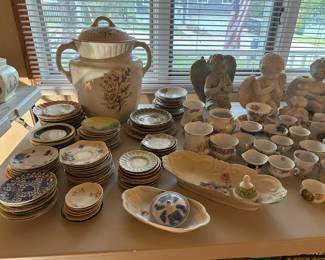 china teacups and saucers, dishes, small statues