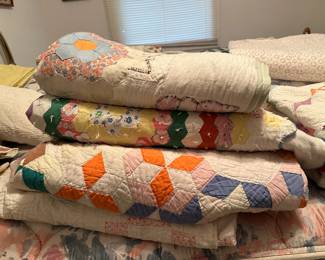 handmde full size bed quilts (over 10) and smaller hanging quilts