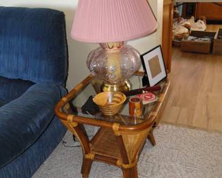 Again, we have to mention that we have a pair of pink lamps, and a pair of rattan tables too