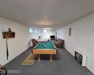 Ceiling tile, pool table, all the carpeting, the fan, and don't worry about what is way in the back, we got that covered too, and yes, that is a shop vac