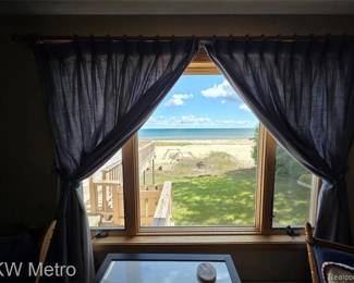 The view has already been purchased, so we have to leave it with the home, but the drapes are for sale
