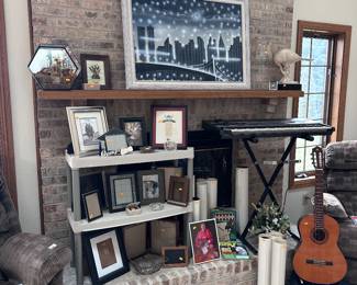 Original artwork, picture frames, acoustic guitar, home decor