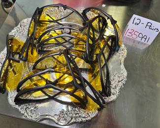 12 Pairs Of Glasses 
