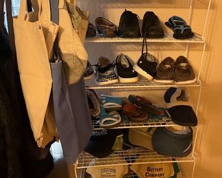 Assortment of shoes and rack for storage