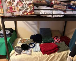 Decorative and bed pillows
Blankets
Bunk bed
Vintage women’s hats 