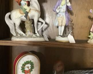 More of the porcelain firgurines.  Some of these items are music boxes.