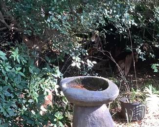 One of the cement bird baths.