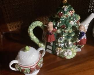 This is a Waterford Christmas Teapot.  Has the creamer and sugar bowl with small matching plates.