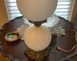 Beautiful vintage hob knob lamp with metal carved bottom.