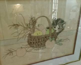 Close up of the art pieces signed.