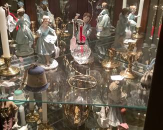 More figurines  in Curio cabinet.