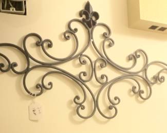 Metal wall hanging.