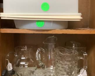 On top is a Tupperware cake and pie container.