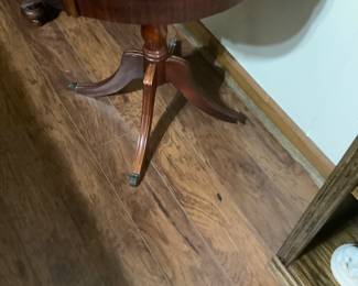A round table with drawer.
