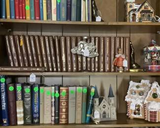 One of the bookcases loaded with Bibles, great books, Department 56 Christmas houses along with other beautiful items.