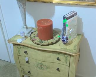 3 drawer chest with flowers.