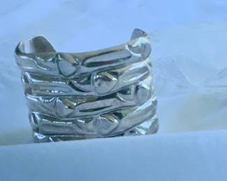 Sterling, yes sterling silver wide band bracelet.