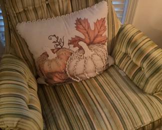 Close up of one of the chairs with Fall pumpkin pillow.
