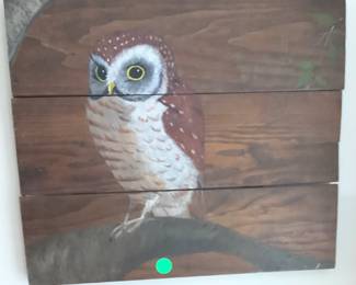 A rustic hand painted owl on boards.  Look at those beautiful eyes.