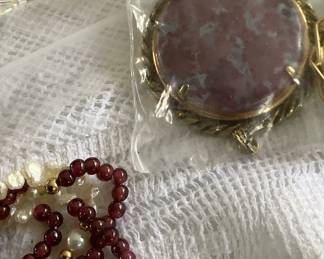Pins with stones.