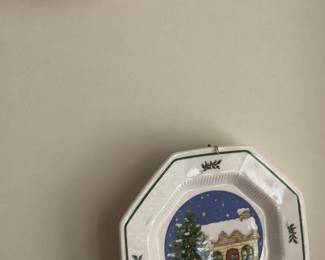 One of the many hanging Christmas plates.