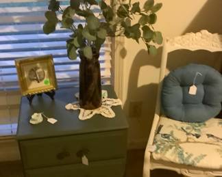 The green handpainted end table with white chair and beautiful bird fabric.