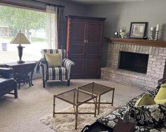 Striped chair. Leather recliner. Drop-leaf accent table. Large TV armoire.