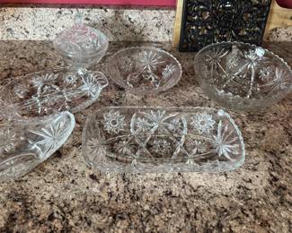 Assorted glass serving pieces.